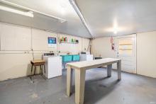 Laundry and storage unit area in lower level