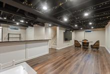 Basment/family room w/ plank vinyl flooring