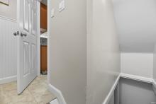 Landing from backyard to kitchen and basement