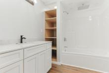 Very Large Bathroom with Built In Shelves