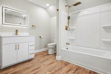 Upstairs bath with washer and dryer